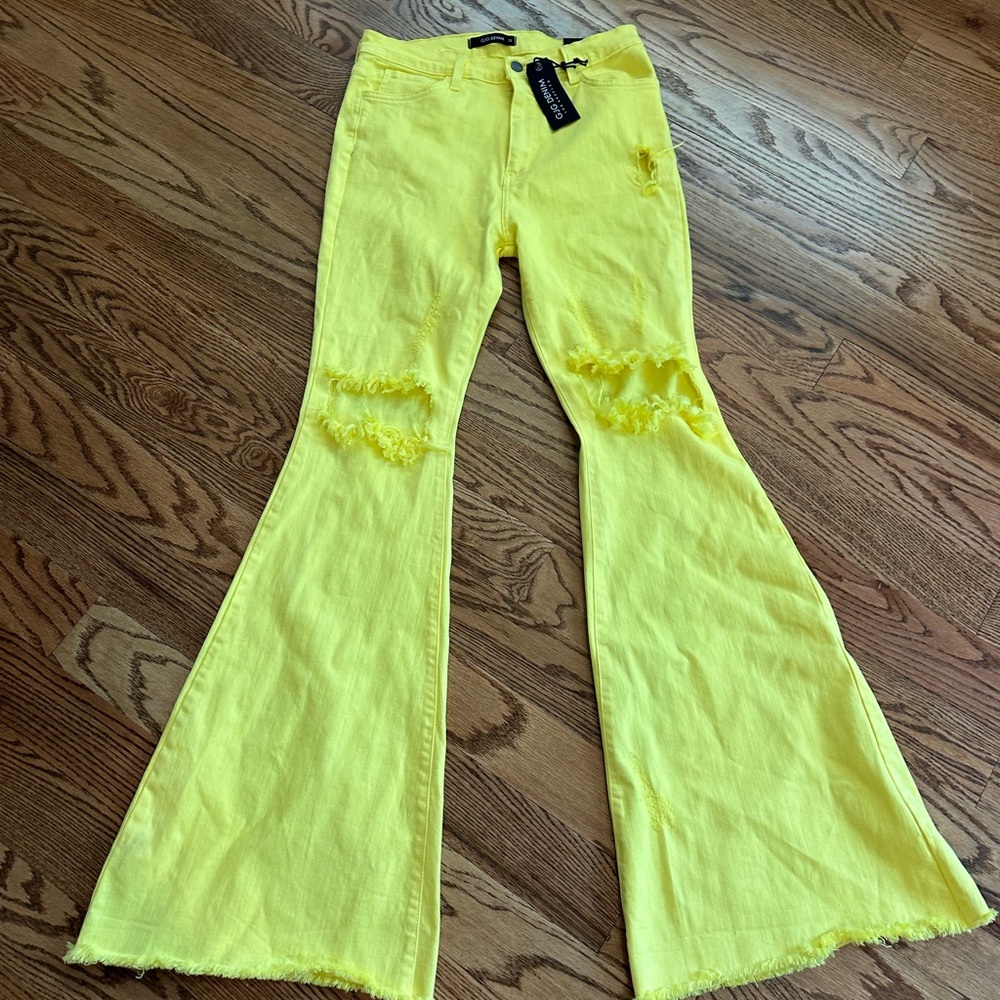 Flare leg distressed yellow jeans